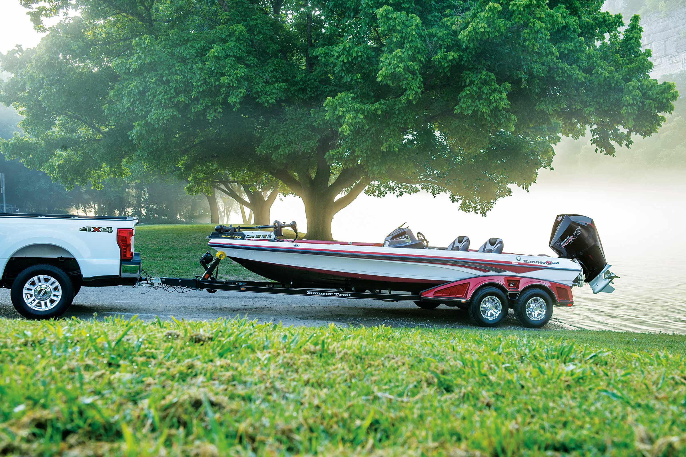 truck pulling boat on trailer